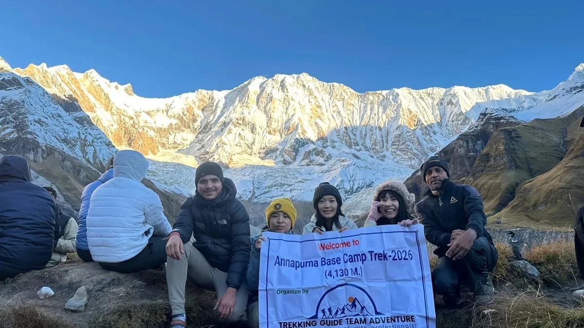 Trekking group at Annapurna Base Camp (4,130m) at sunrise