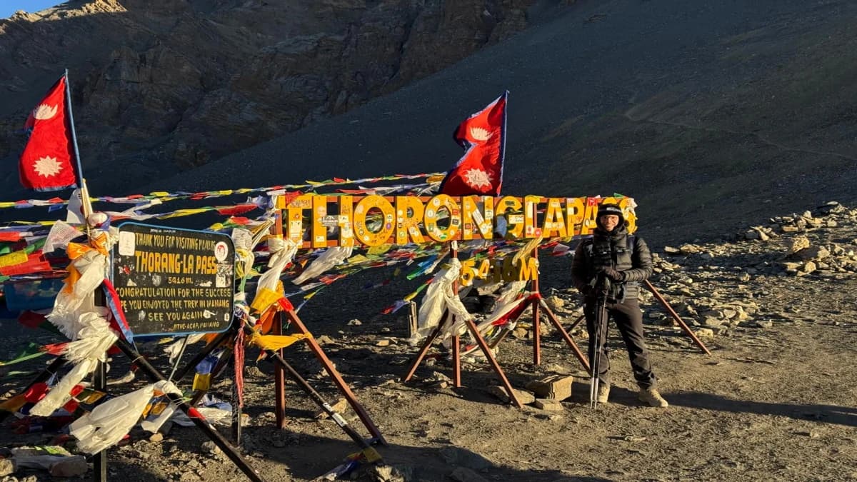 Trekker at Thorong La Pass 5416m on Annapurna Circuit Trek