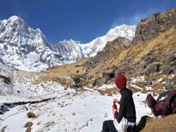 Annapurna Circuit and Annapurna Base Camp Trek - trekker with mountain views